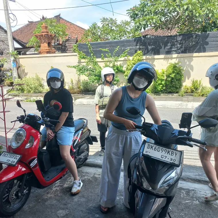Happy customer with a rented scooter in Bali