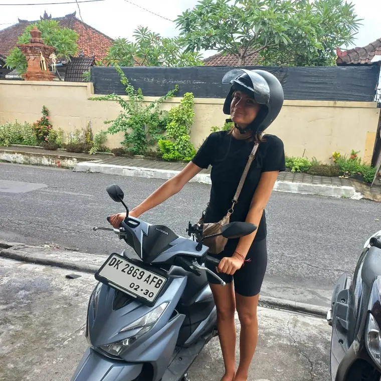 Happy customer with a rented scooter in Bali