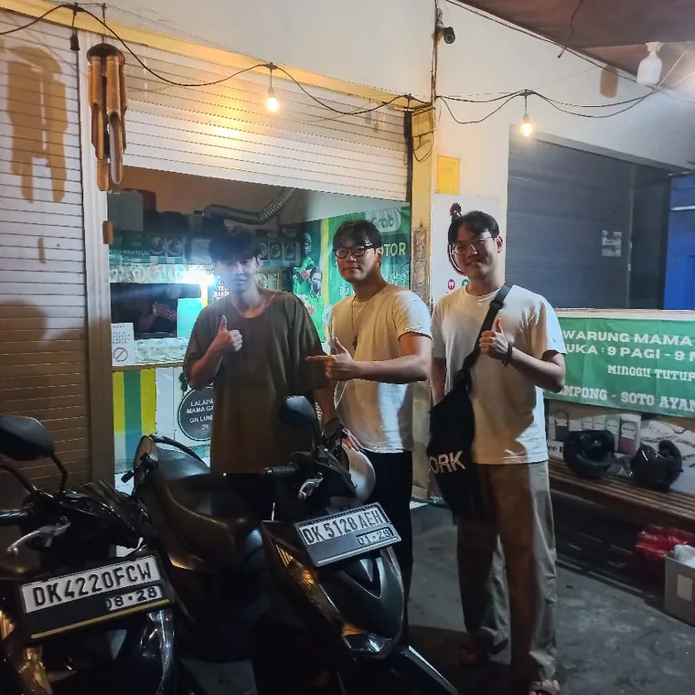 Happy customer with a rented scooter in Bali