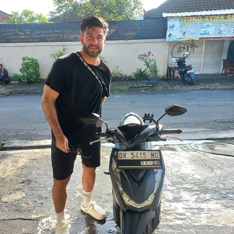 Happy customer with a rented scooter in Bali