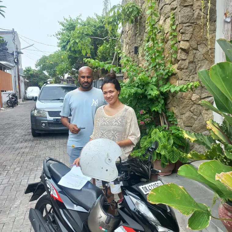 Happy customer with a rented scooter in Bali